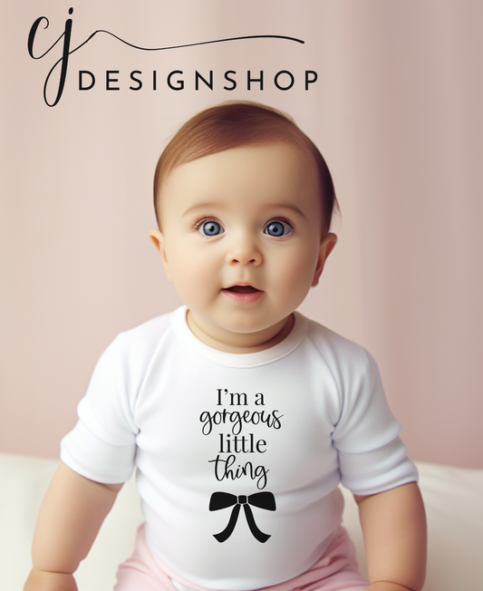 I'm a gorgeous little thing onesie